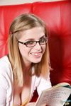 Nerdy girl Penny Pax gets cum on her glasses by jerking off a cock